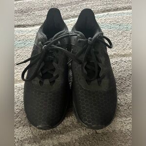 Woman’s black Nike shoes size 8